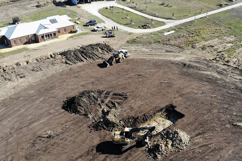 Busy Digger constructs and excavates dams